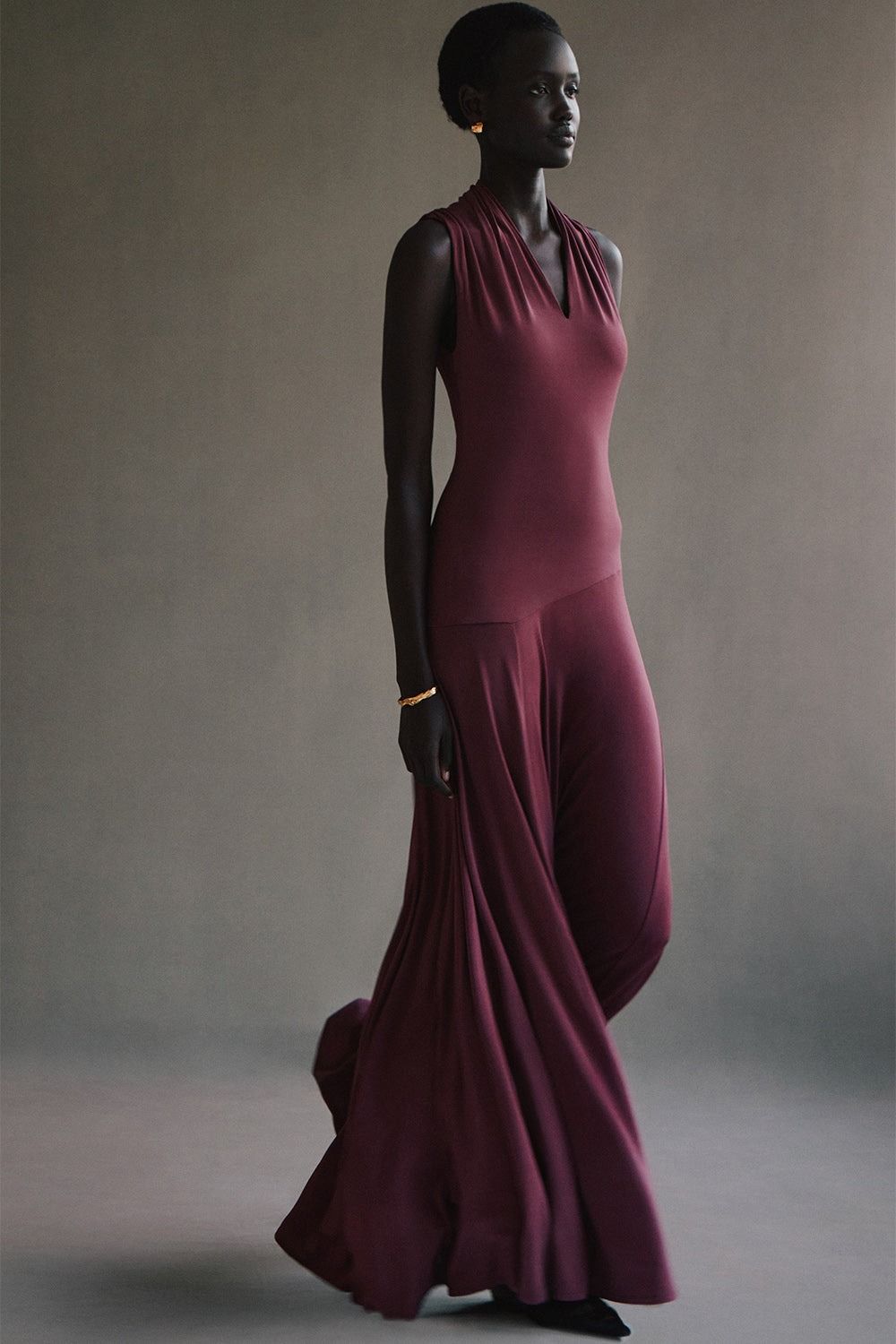 Images may contain clothing dress evening dress formally wearing adult fashion dress accessories and bracelets