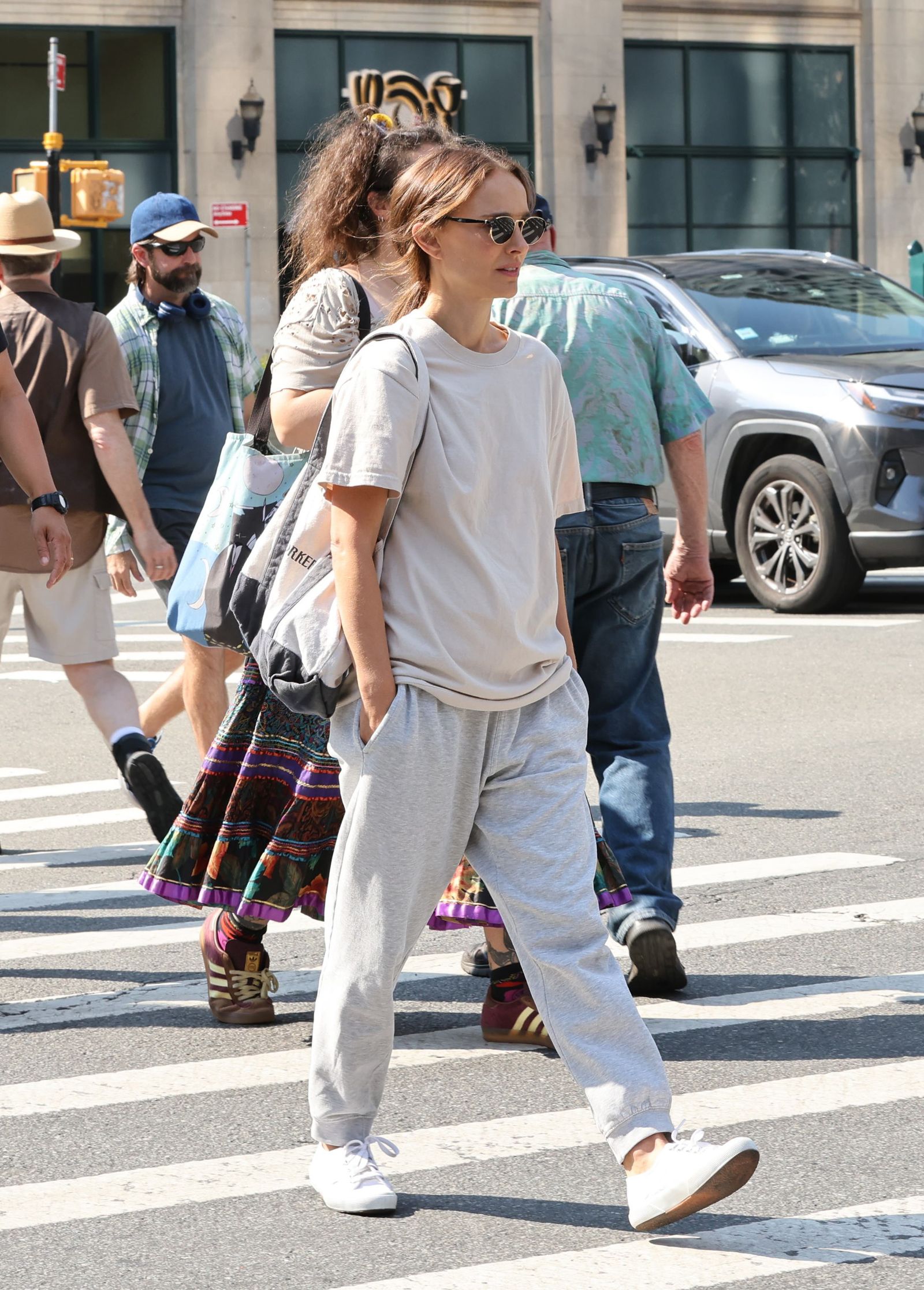 Images may contain Natalie Portman Heath Bell Pedestrian Clothing Shoes Hats Hat Accessories and Glasses