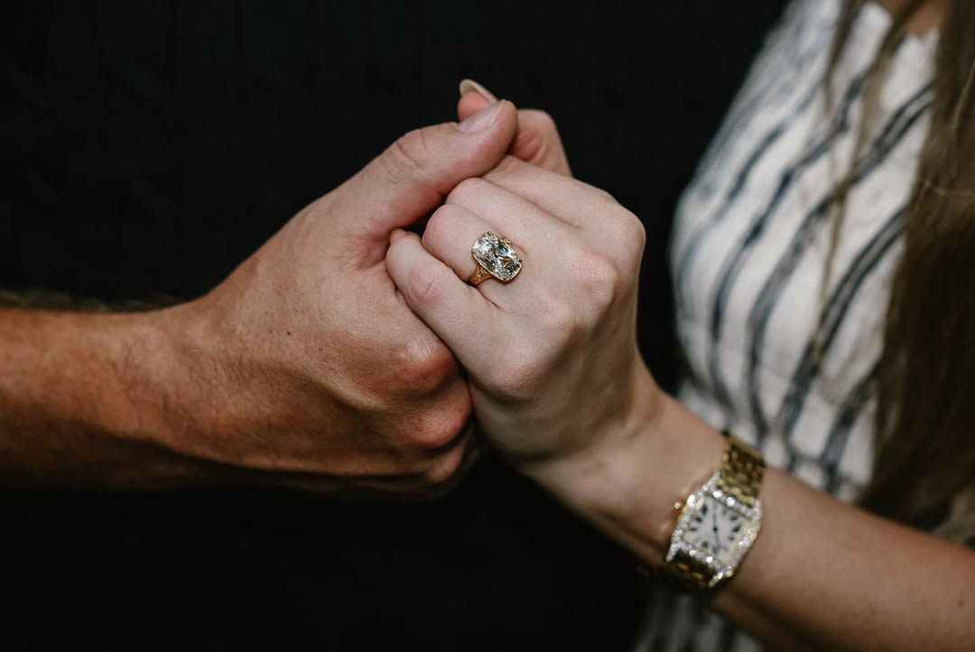 Images may contain accessories jewelry ring body parts fingers hand hand diamond gemstones and silver