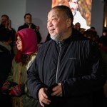 A man looking at a group of people.