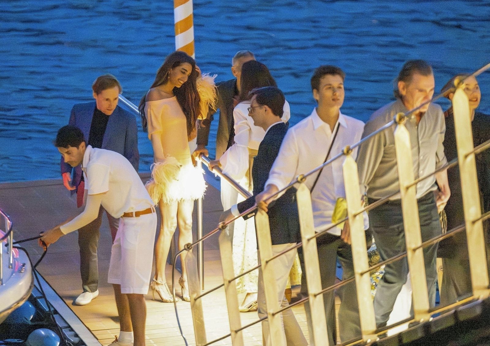 Exclusive network must require pricing for Lake Como Italy George Clooney and his wife Amal arrive at Lake Tremezo by boat...