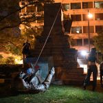 A group of people overturned the monument.