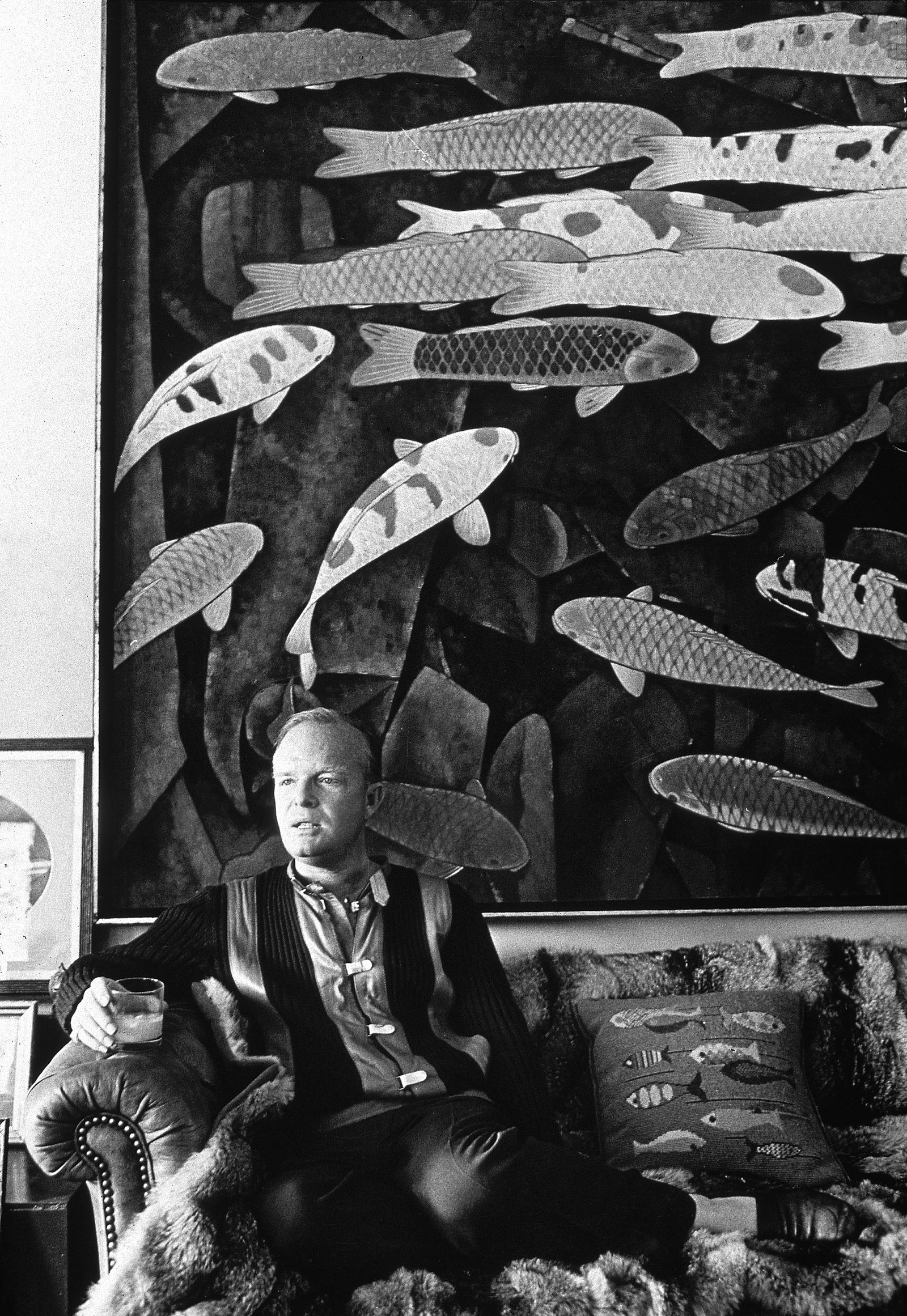 Images may contain Truman Capote Face Head Photography Portrait Art Painting Animals Fish Marine Life and Adults
