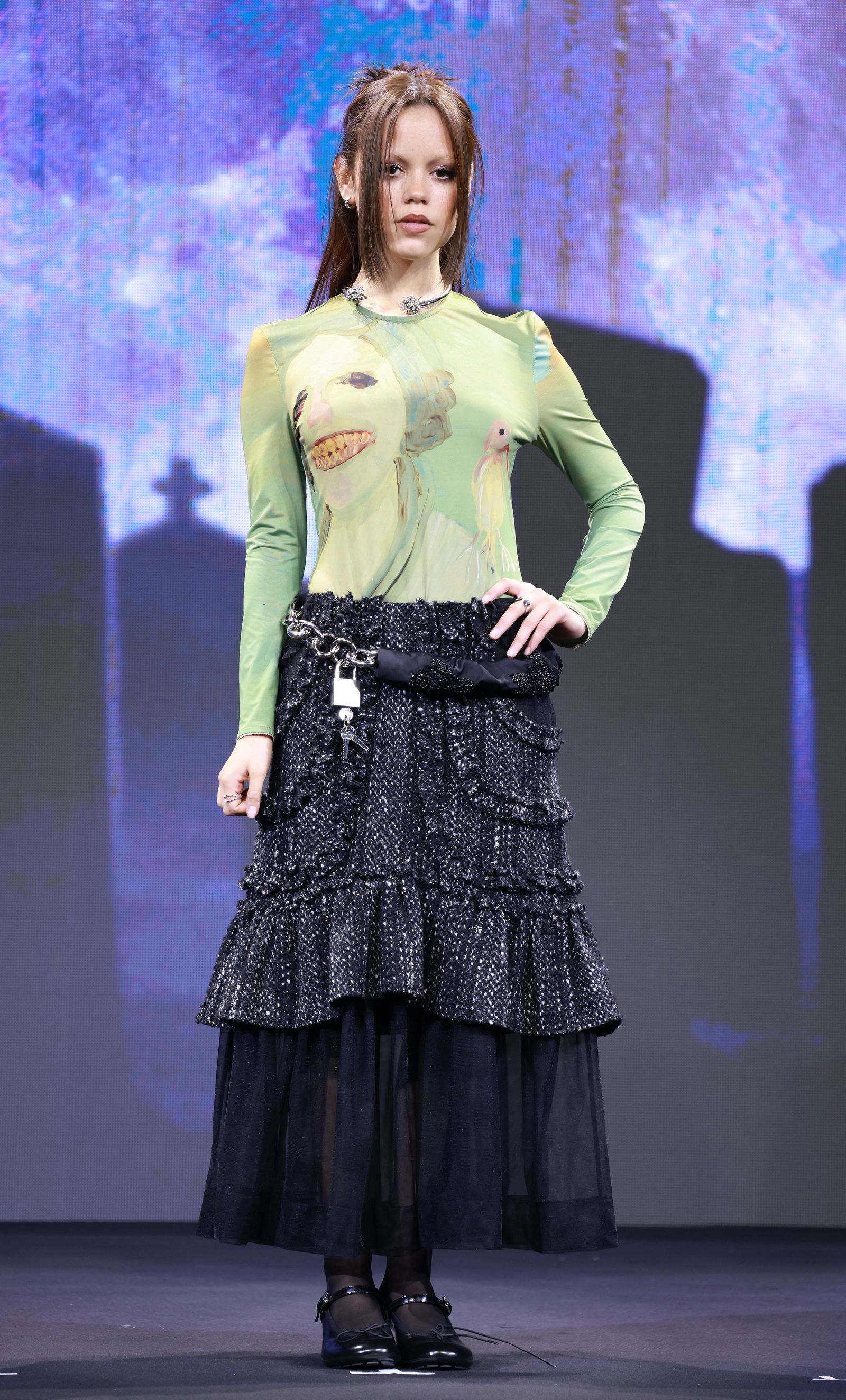 Images may contain Jenna Ortega fashion outfit long sleeves adult skirt and performer