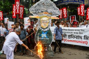 Suci Communist supporters burned a statue of Donald Trump at a protest rally against U.S. President Donald Trump against his recent war revelry and war attitudes in the Israel-Palestine conflict during the Israel-Palestine conflict during the Israel-Palestine conflict during the Hiroshima Day observation in Kolkata, India.
