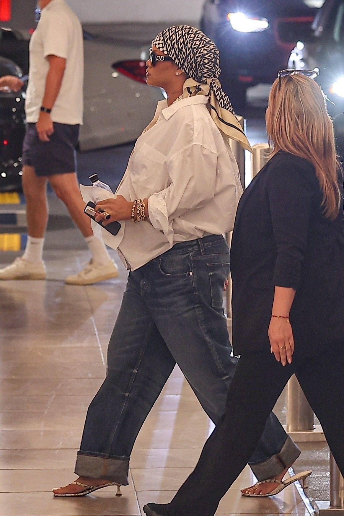Discovered exclusive Los Angeles Ca Rihanna exclusive runner in Beverly Hills, wearing a pair of wide jeans and...
