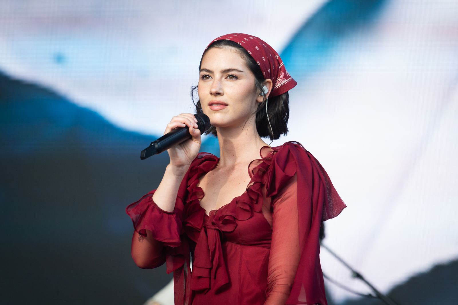 Images may contain performers solo performance adult electrical equipment microphone and person