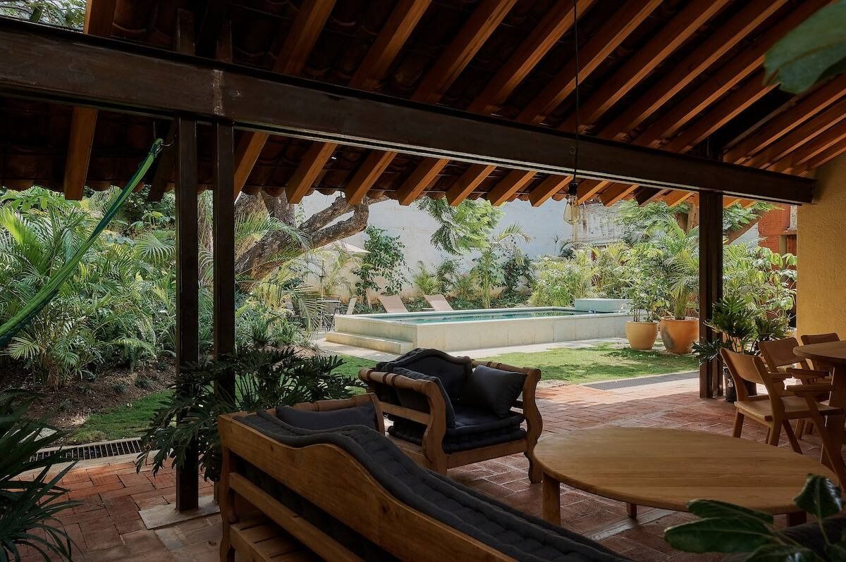 Images may contain architecture hotel resort house housing interior design and table