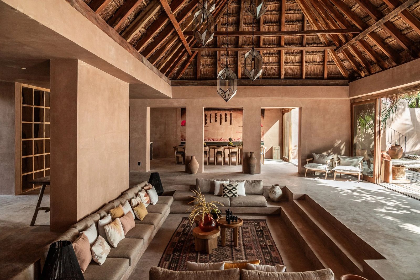 Images may contain home decoration building building furniture in interior living room lights carpets and plants