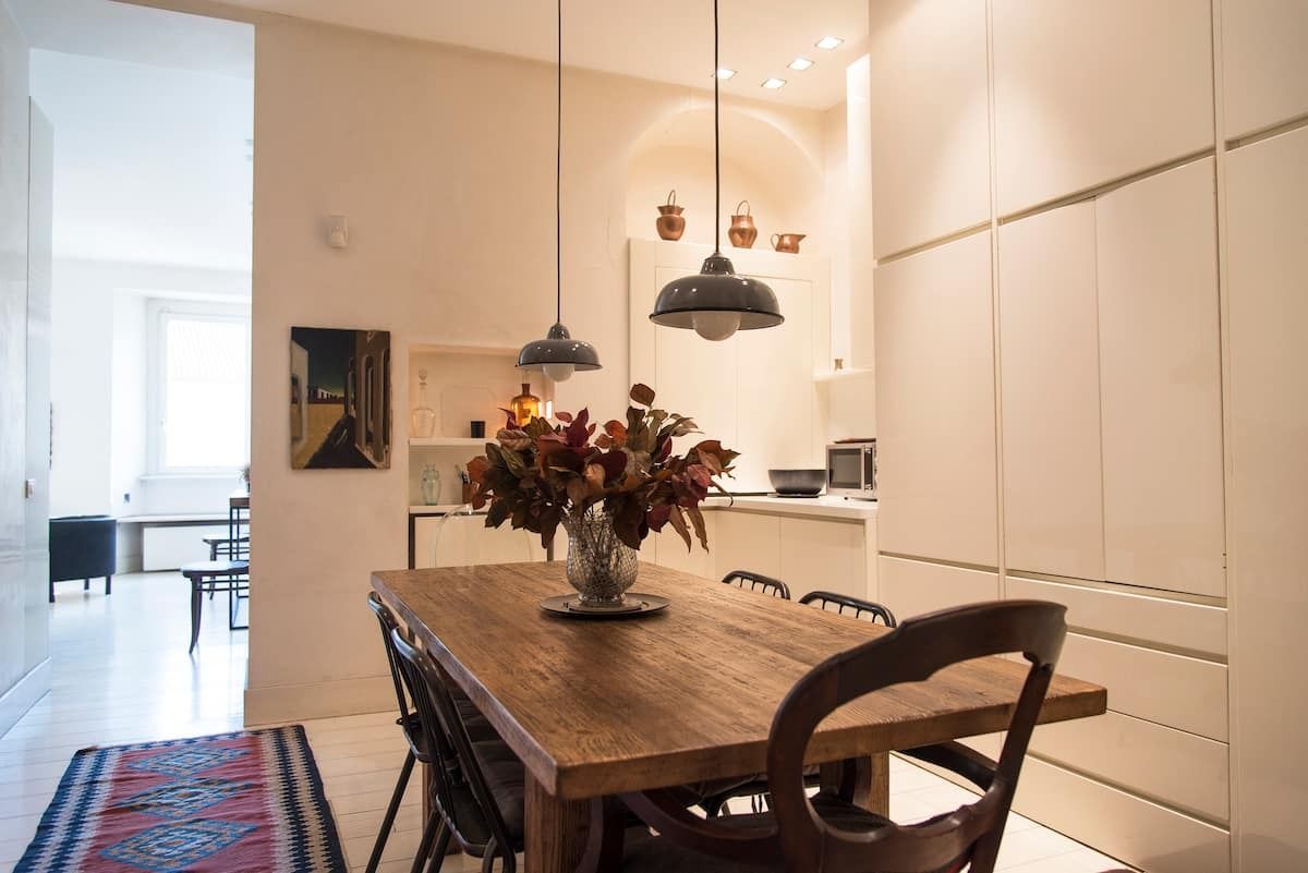 Images may contain architectural dining table furniture interior dining table and interior design
