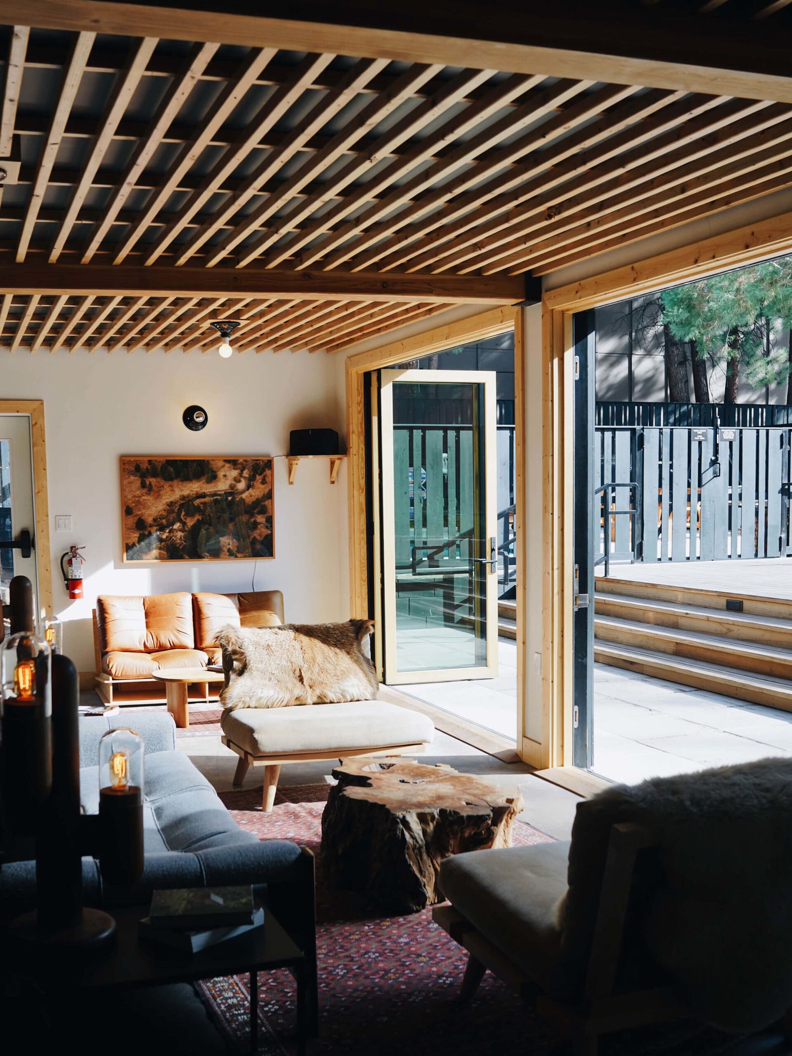 Images may contain interior interior design home decor book publication chair sofa door table and artwork