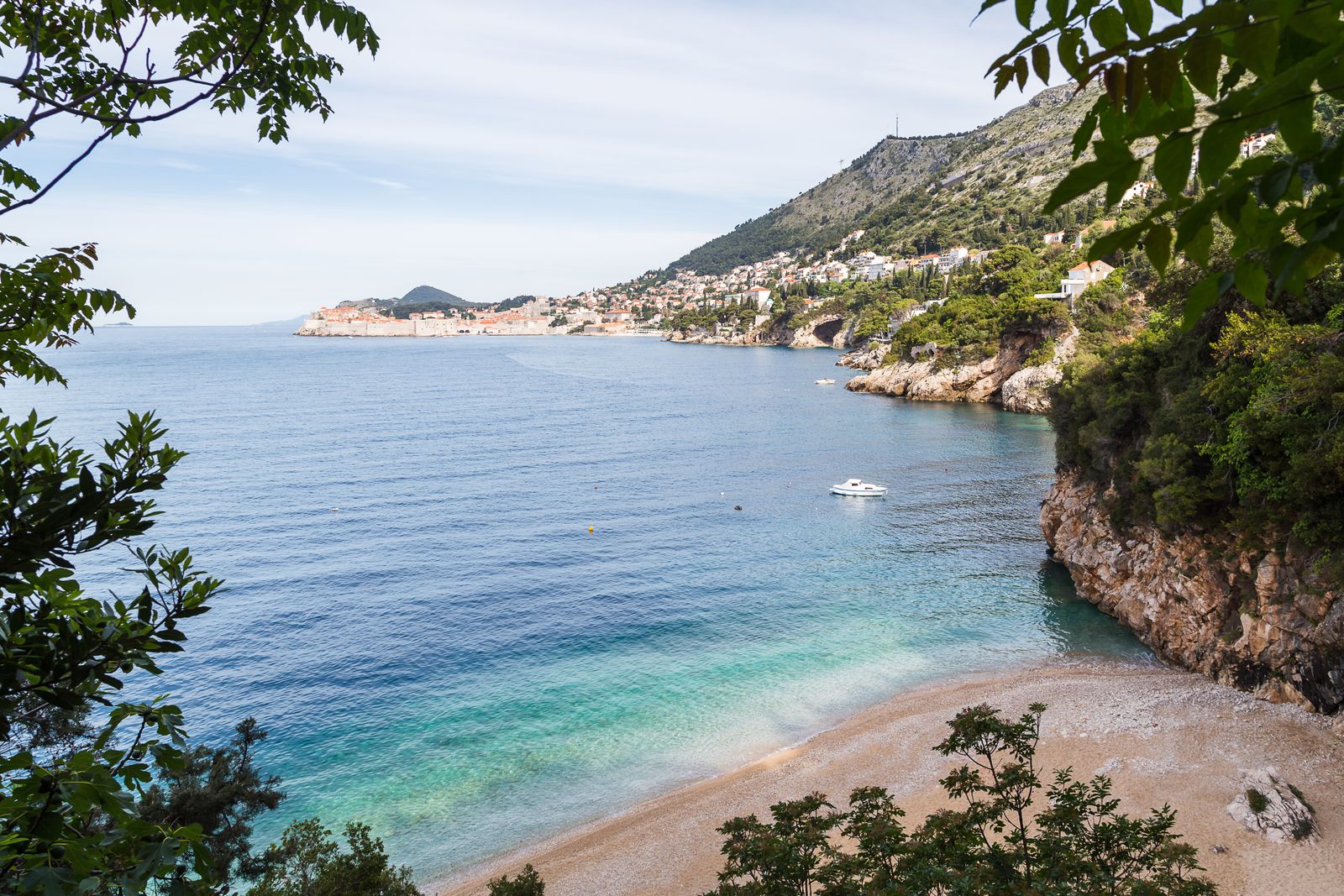 Images may contain natural outdoor seawater coast coast coast beach ship transport vehicles and bays