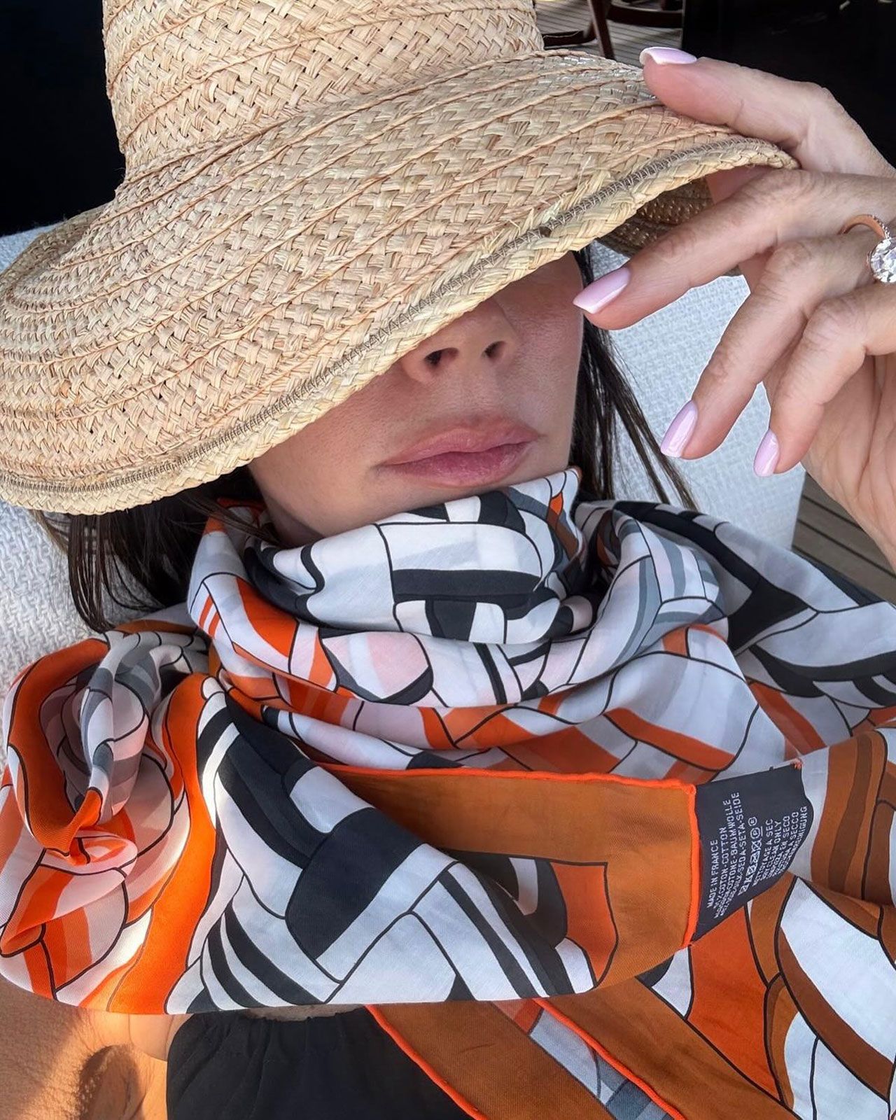 Images may contain the head and face of a person with a hat