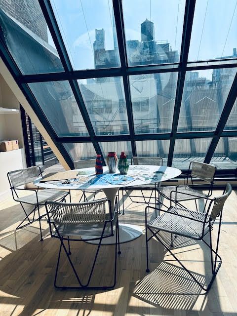 Images may contain furniture tables, chairs, dining tables, floors, building dining room and interior
