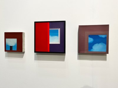 Three square paintings of different sizes showing tight crops of windows.