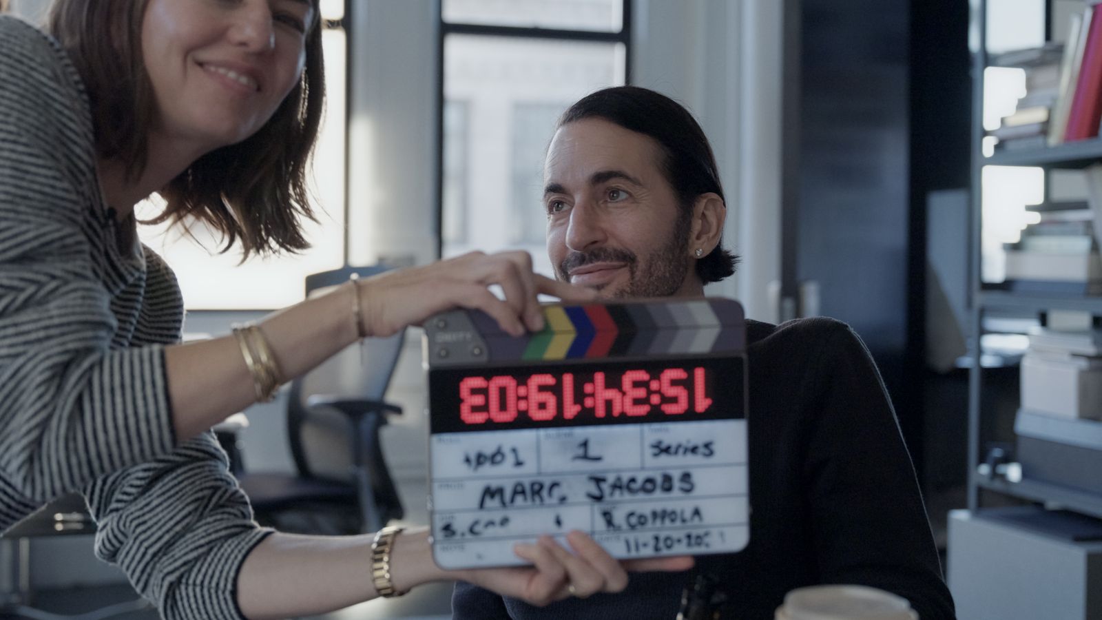 Images may contain MARC JACOBS SOFIA COPPOLA Adult Head Electronics Screen Facial Text and Clap Board
