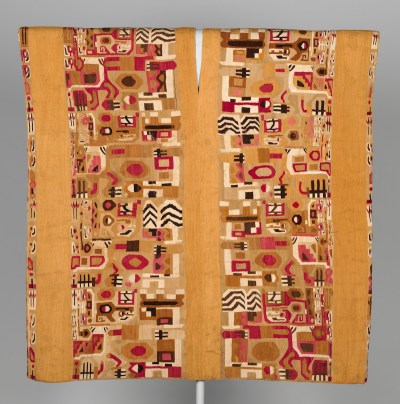 A tunic lined with geometric patterning.