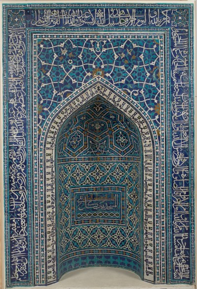 A blue prayer niche with Kufic calligraphy acting as a border.