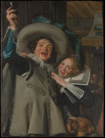 A painting of a smiling man holding a glass and wearing a feathered hat. A smiling woman with rosy cheeks places one hand on his arm.