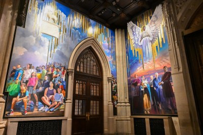A new mural by artist Adam Cvijanovic, the southern and western panels seen here are unveiled on Wednesday, September 17, 2025 at St. Patrickís Cathedral in New York. The mural is the largest permanent work of art commissioned for the Cathedral in its 146-year history, celebrating the 1879 ghost of the door knock in Ireland, the faith of generations of immigrants heading to New York, and the service of the first responders in New York City. (Diane Bondareff/AP Content Services of Archdiocese, New York)