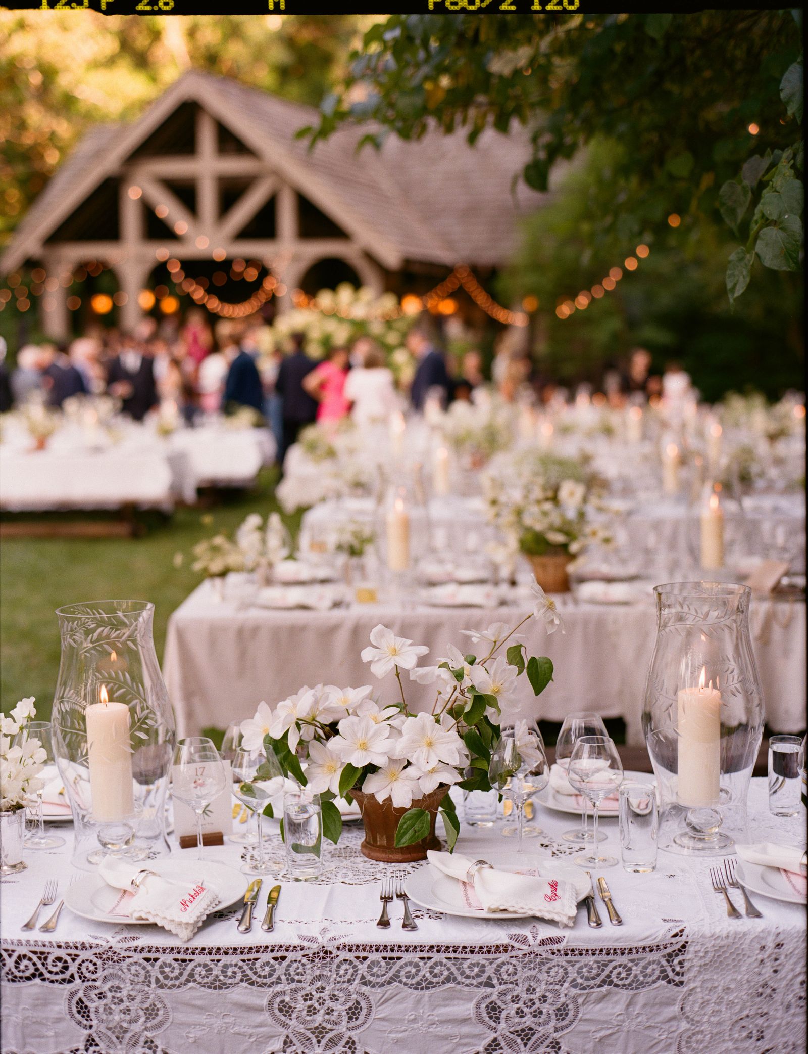 Images may contain cups, dining table furniture, table blades, cutlery, forks and floral arrangements
