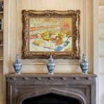 Exquisite frame artwork on stone mantel.