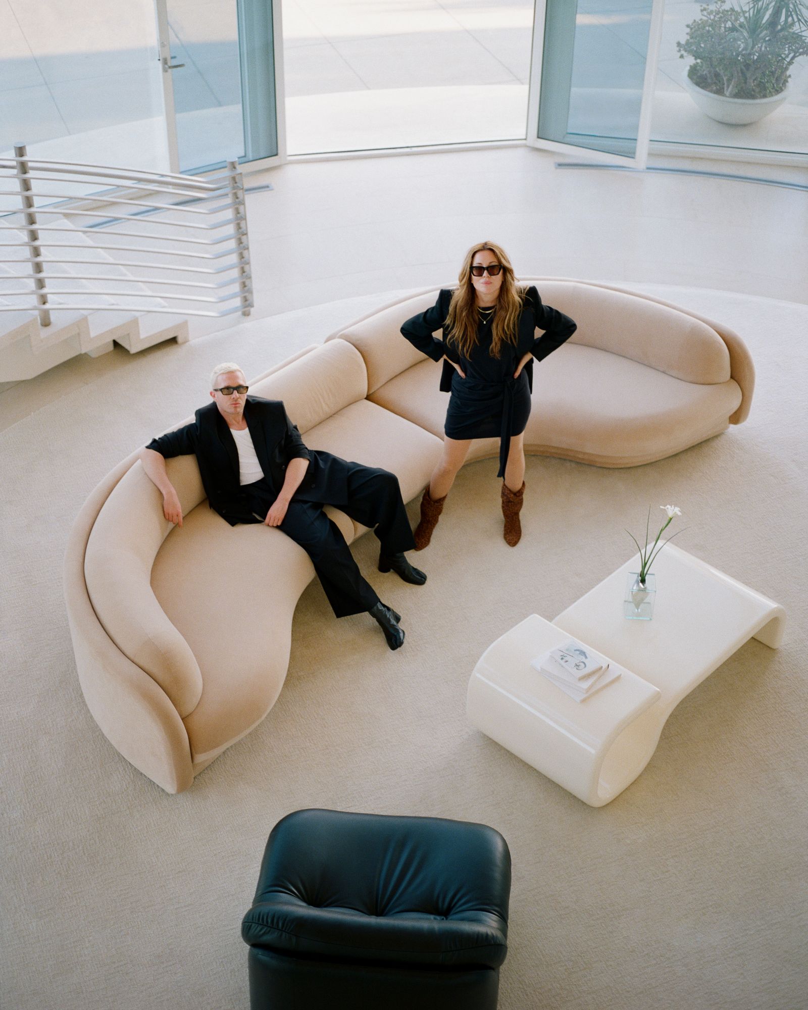 Leigh McKeown and Tiffany Powell sat on the poet's sofa.