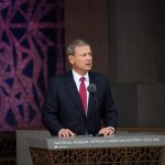 A man in podium clothes.