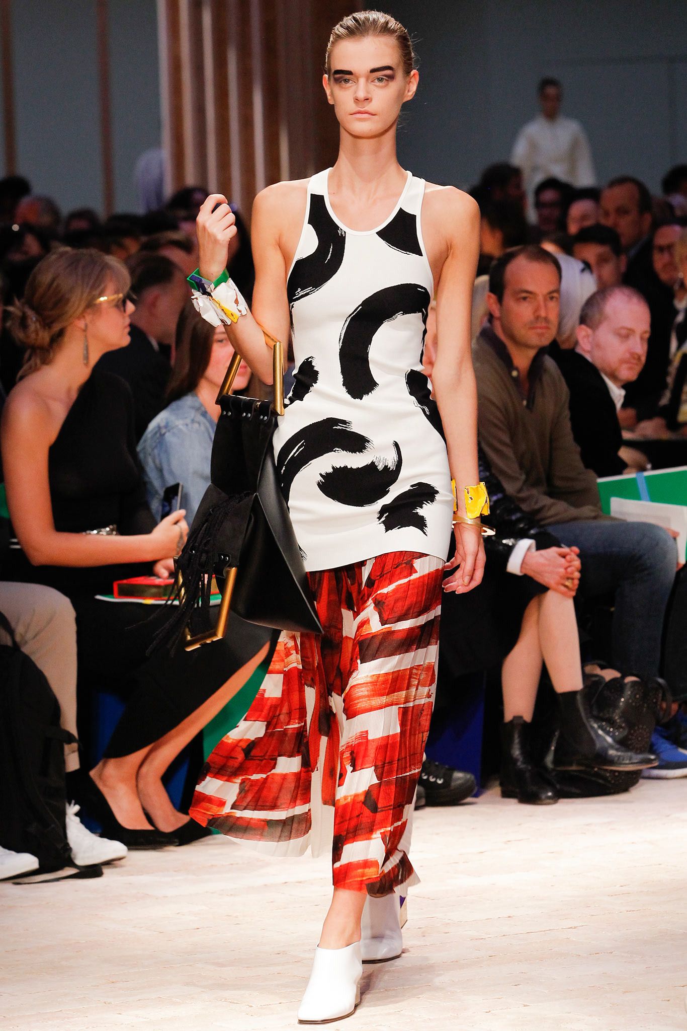 Images may contain crowd audience fashion shoes and footwear in human Chad Allen costume