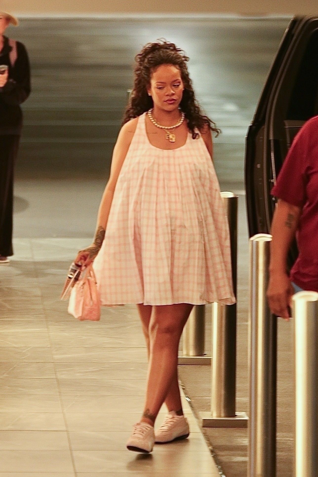 Exclusive Los Angeles Ca Rihanna is found leaving her car with a comfortable loose fit to arrive at the building...