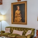A painting hanging above the sofa.