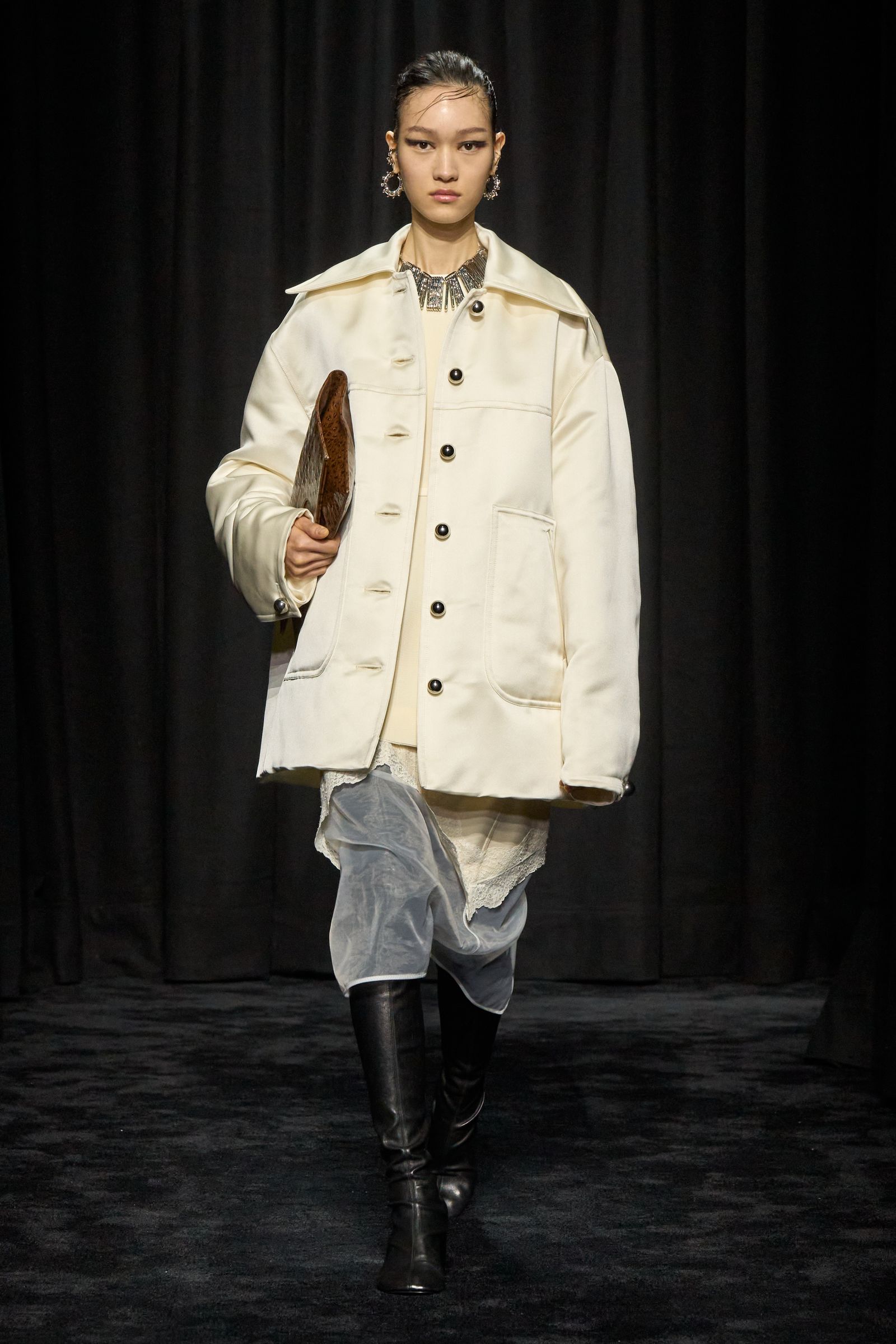 Images may contain costumes, adult coats, shoes, and solo performances