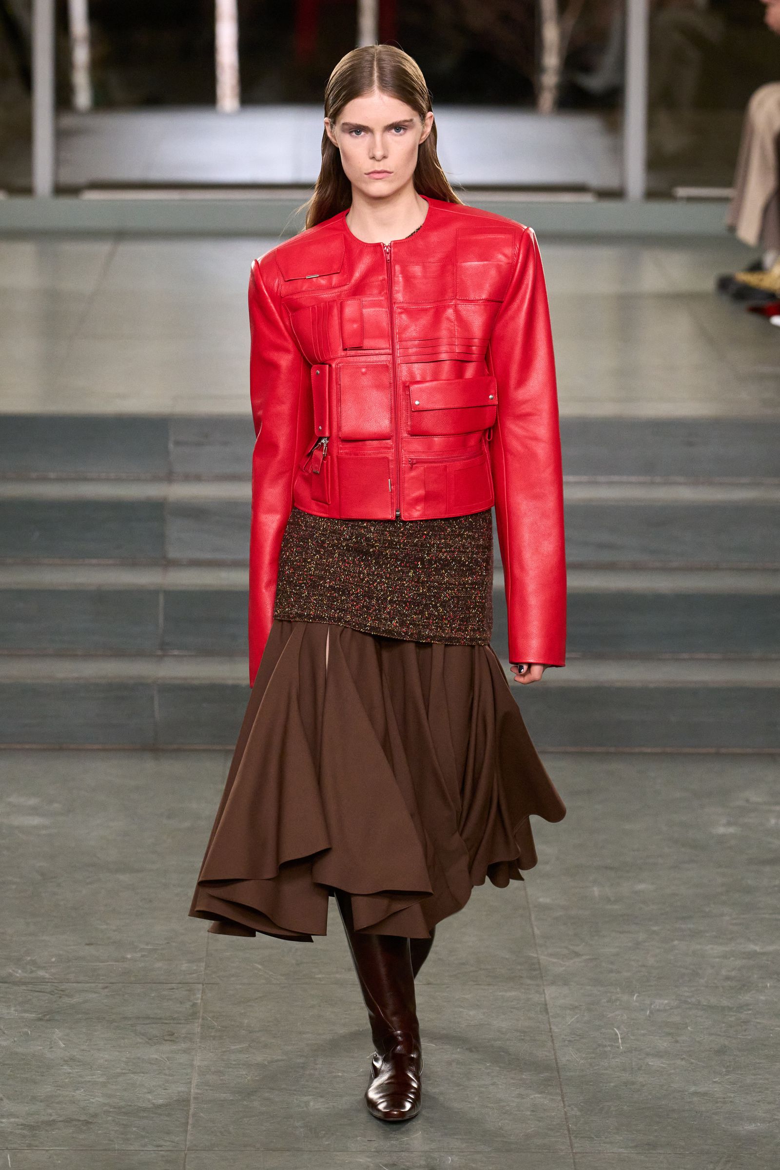 Image may contain clothing, coats, jackets, adults and skirts