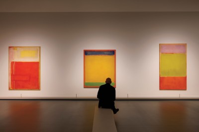 PARIS, FRANCE - OCTOBER 17: Visitors look at paintings during the Press Preview of the Exhibition Rothko at the Louis Vuitton Foundation in Paris on October 17, 2023 in Paris, France. (Photo by Luc Castel/GettyImages)