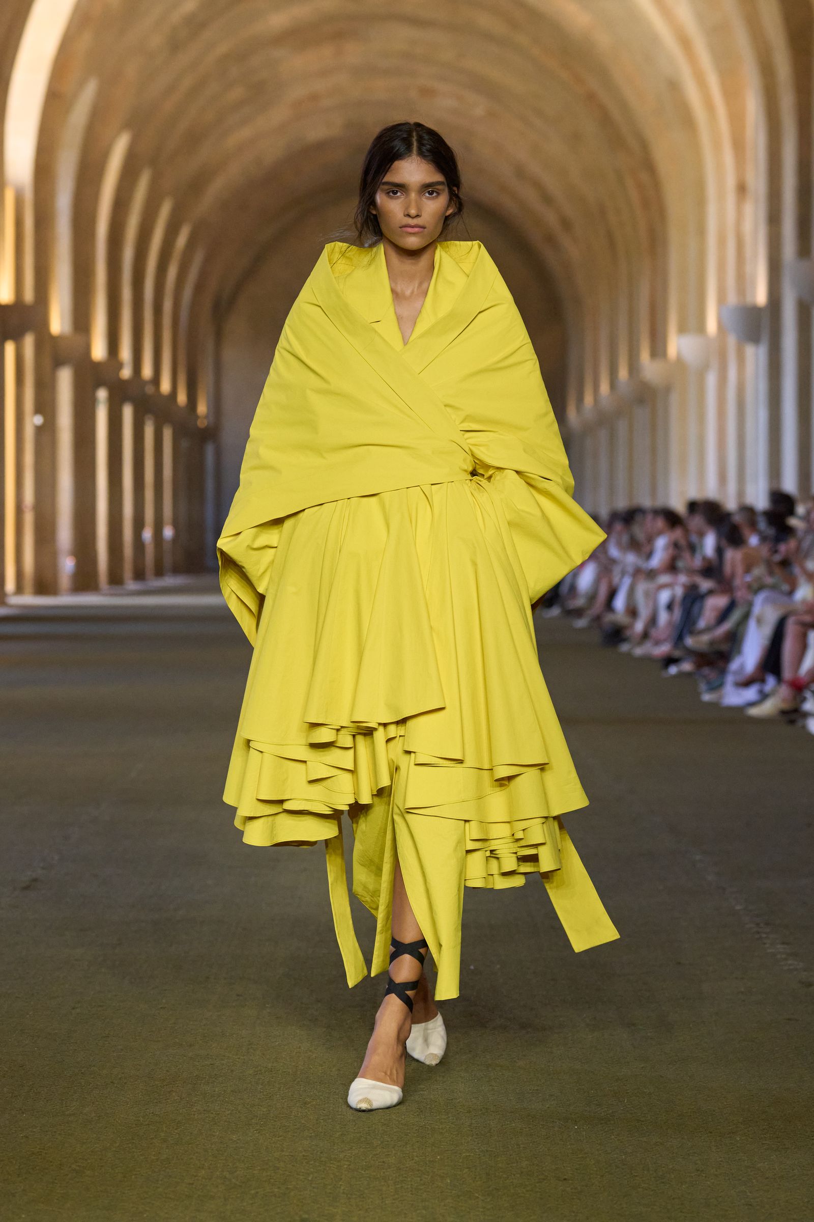 Image may contain Fashion Adult Person Clothing Coat Footwear and Shoe