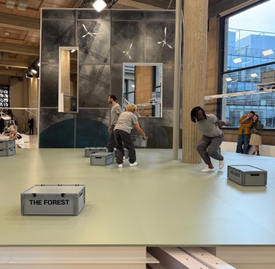 A group of performers approached boxes emblazoned with phrases such as 