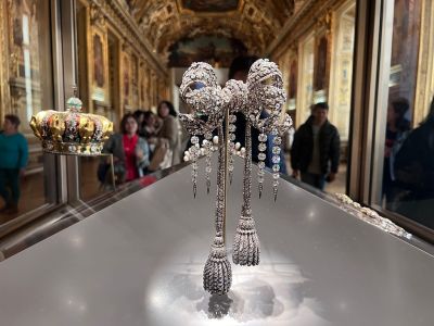 PARIS, FRANCE - OCTOBER 21: A collection of luxury jewelry including Queen Eugenie's crown and large corset bow are on display at the Louvre Museum on October 21, 2023 in Paris, France. The Louvre in Paris will reopen to visitors on October 22, 2025, three days after thieves stole some 88 million euros ($102 million) worth of jewelry in a daring daylight robbery, the museum said on its website. (Photo by Zhang Mingming/VCG from Getty Images)