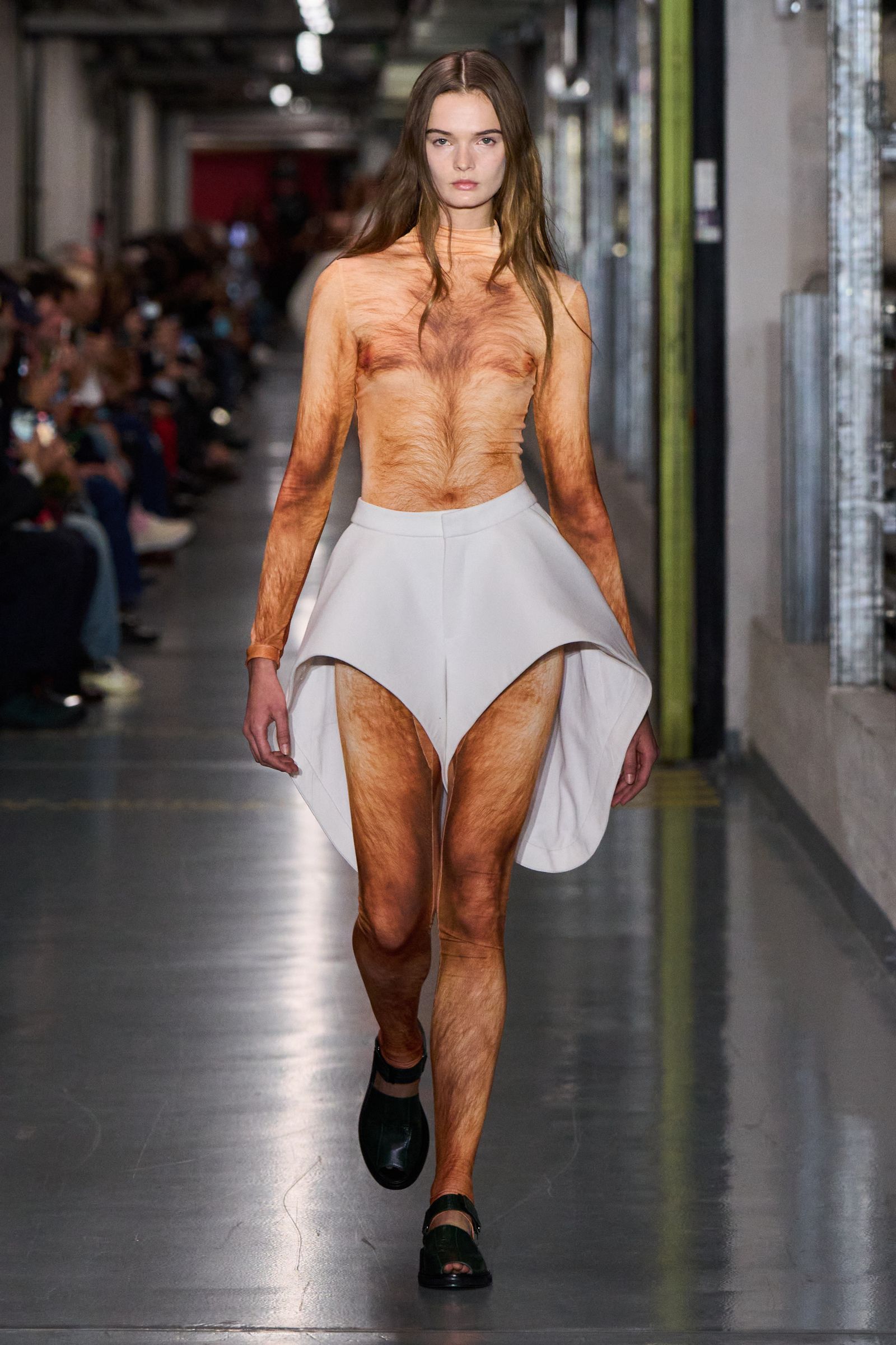 Kim Kardashian wears a bra made of hair, and that's about it