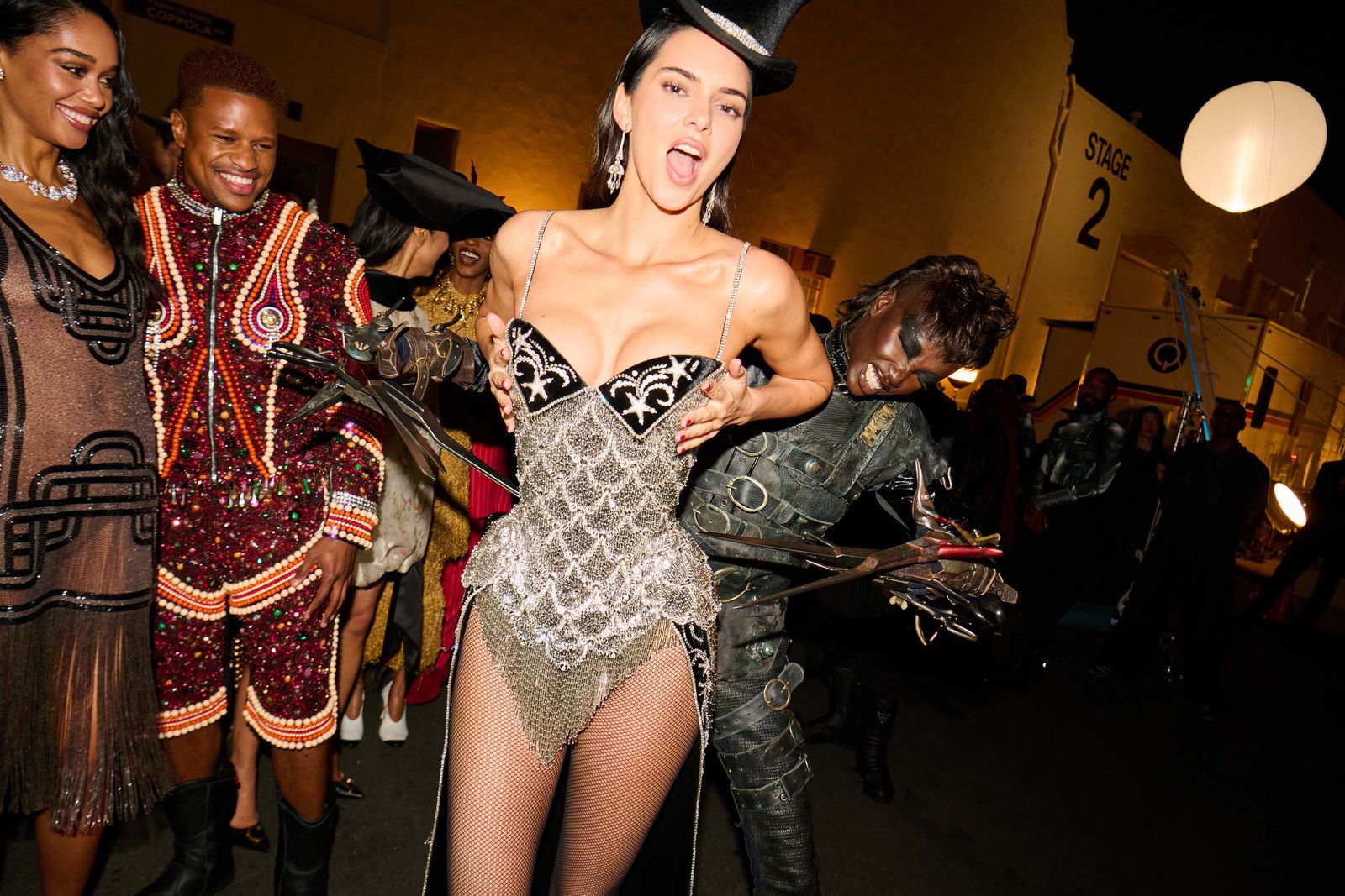 Jenner wore an original Moulin Rouge outfit and earrings by BenAmun.