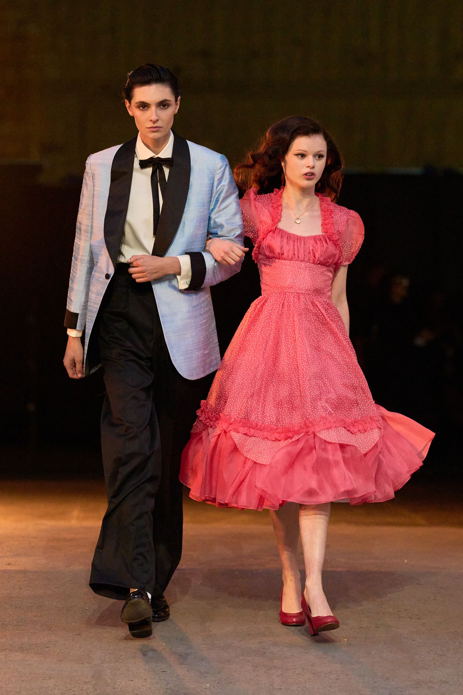 Both wore costumes designed by Arianne Phillips for 