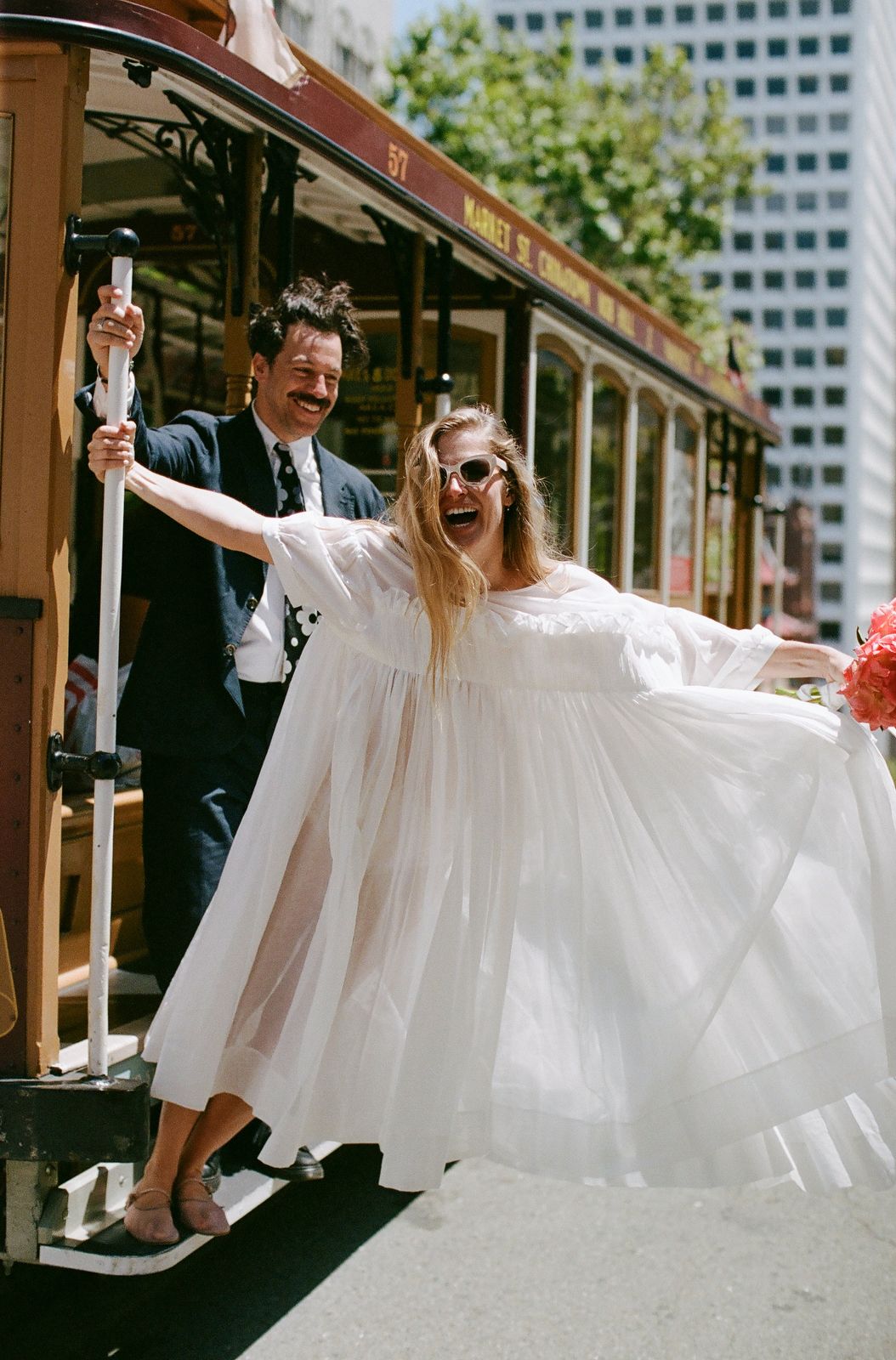 Bride wears OneofaKind Molly Goddard gown for vibrant Bay Area wedding