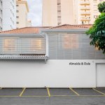 Exterior of the two-story art gallery with the Almeida & Dale logo.
