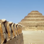 Egypt's oldest upright step pyramid, designed by Imhotep for King Djoser, is located in Saqqara, an ancient necropolis 30 kilometers south of modern Cairo.