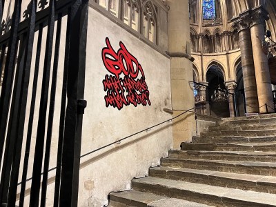 The decal in graffiti-like font reads 