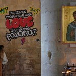One stares at graffiti-like scrawls that read 