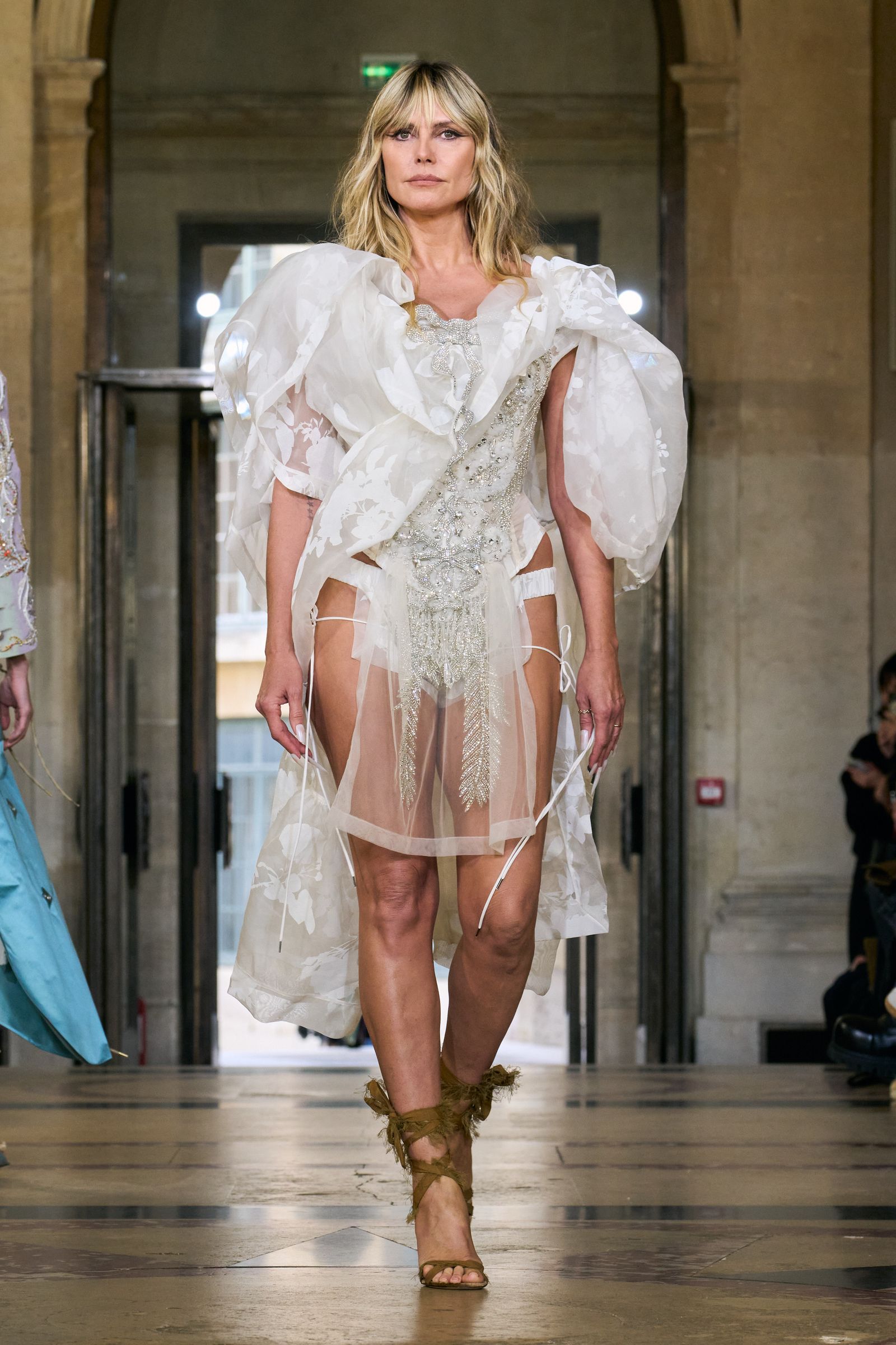 Heidi Klum steps out in Vogue Hollywood World 2025 in a super sheer bright white outfit