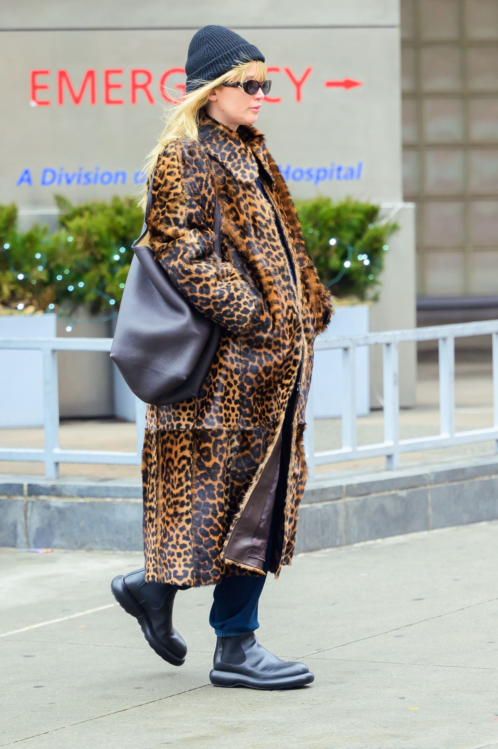 Images may contain Jennifer Lawrence Clothing, Outerwear, Adults, Shoes, Footwear, Accessories, Eyewear, Bags & Totes