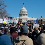 A group of people protested in front of the White House.