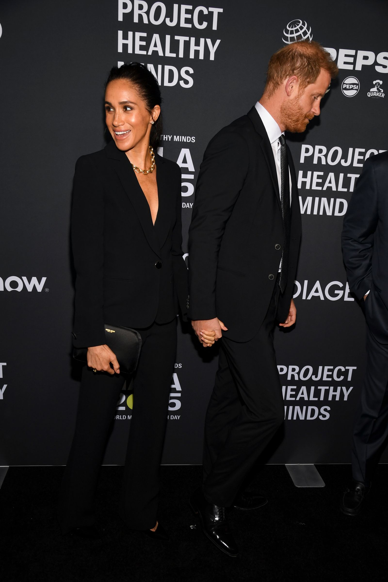 Meghan Markles continues high fashion style in Armani