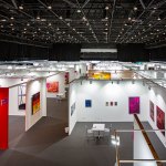 Aerial view of empty art fair showing various booths.